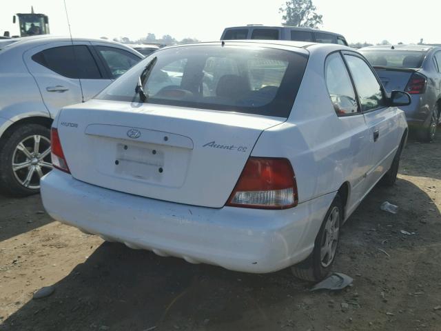 KMHCG35C31U083068 - 2001 HYUNDAI ACCENT GS WHITE photo 4