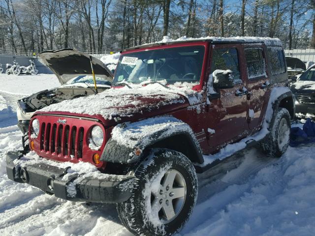 1C4HJWDG8CL215171 - 2012 JEEP WRANGLER U RED photo 2