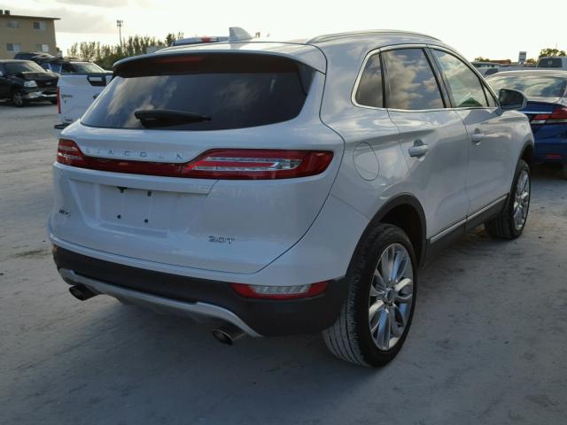 5LMCJ3C95HUL03410 - 2017 LINCOLN MKC RESERV WHITE photo 4
