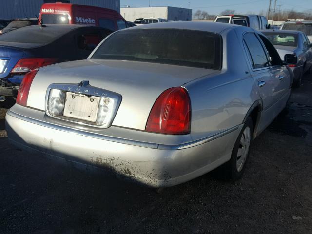 1LNHM83W3YY868427 - 2000 LINCOLN TOWN CAR C SILVER photo 4