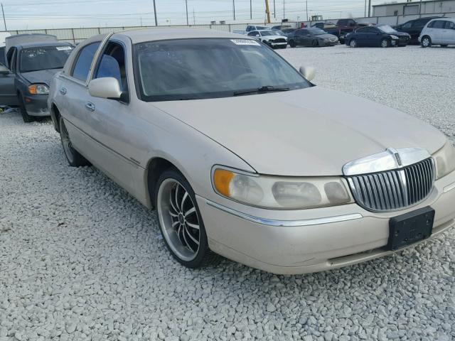 1LNHM83W4XY601568 - 1999 LINCOLN TOWN CAR C TAN photo 1