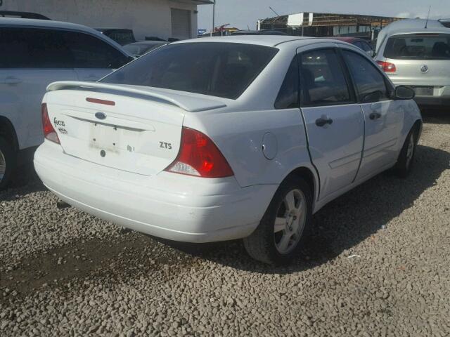 1FAFP38333W130688 - 2003 FORD FOCUS ZTS WHITE photo 4