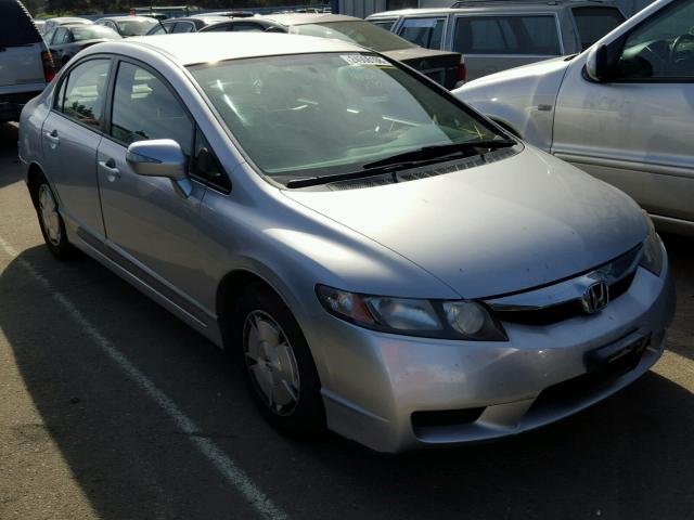 JHMFA3F24BS000218 - 2011 HONDA CIVIC HYBR SILVER photo 1