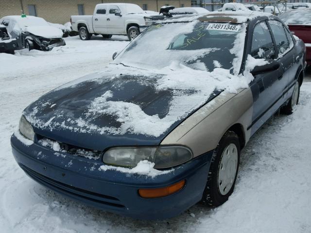 1Y1SK5366RZ079534 - 1994 GEO PRIZM BASE GREEN photo 2