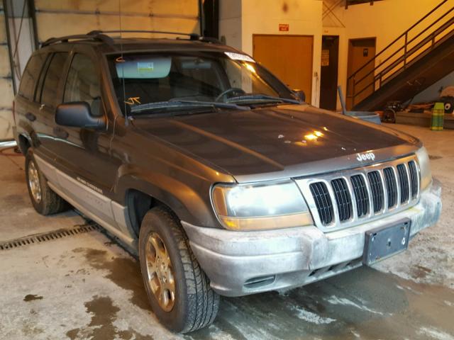 1J4G258S1XC780573 - 1999 JEEP GRAND CHER GRAY photo 1