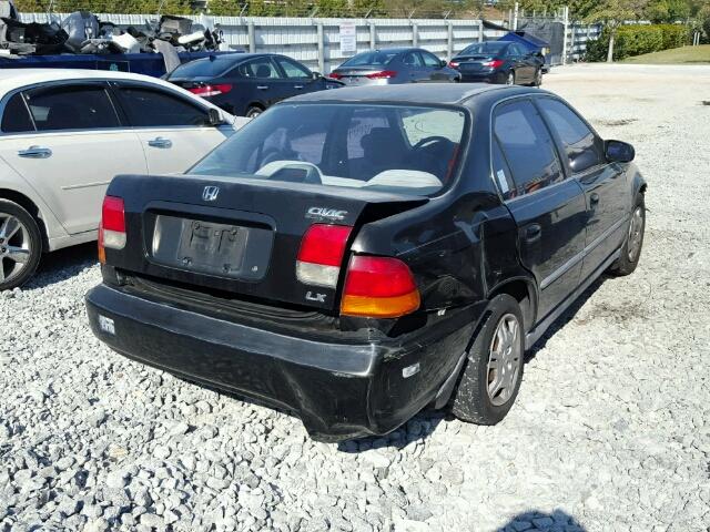 1HGEJ6603TL004609 - 1996 HONDA CIVIC LX BLACK photo 4