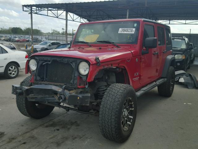 1J4GA39179L702878 - 2009 JEEP WRANGLER U RED photo 2