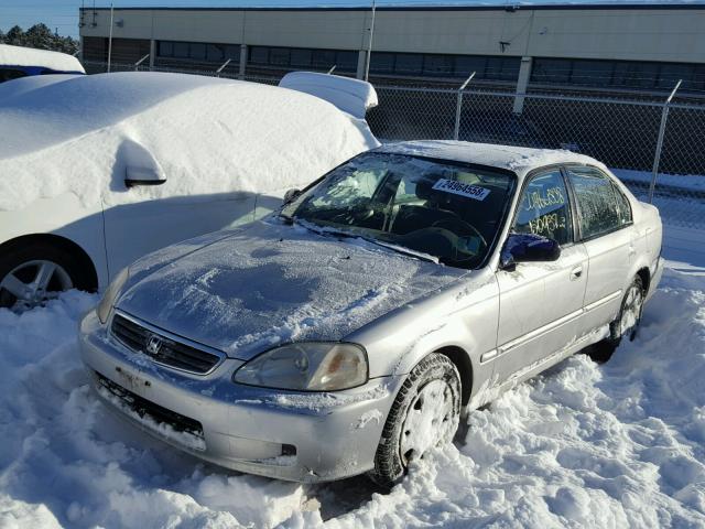 1HGEJ6525XL030606 - 1999 HONDA CIVIC DX SILVER photo 2