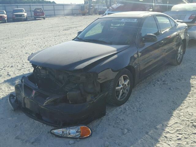 1G2NW52E21C145670 - 2001 PONTIAC GRAND AM G BLACK photo 2