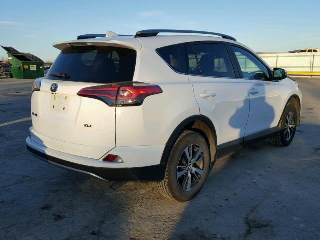 2T3WFREV4HW355374 - 2017 TOYOTA RAV4 XLE WHITE photo 4