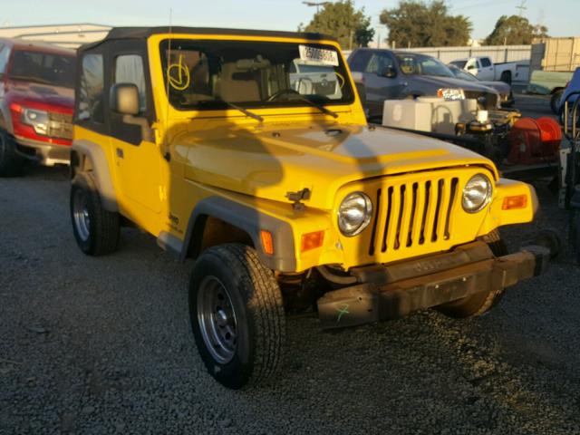 1J4FA29134P747596 - 2004 JEEP WRANGLER / YELLOW photo 1