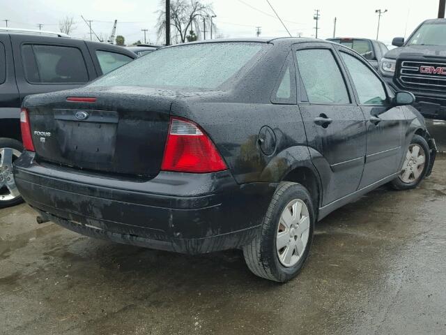 1FAFP34N77W312455 - 2007 FORD FOCUS ZX4 BLACK photo 4