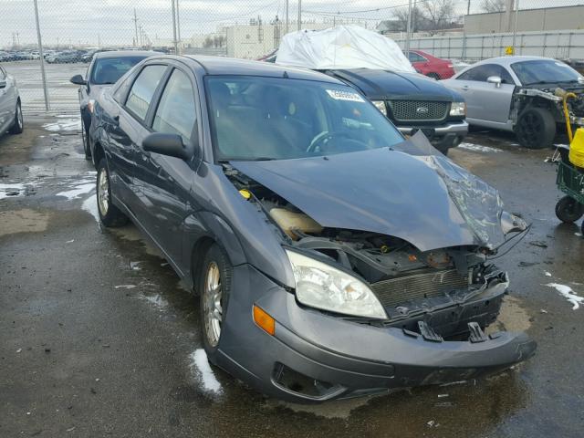 1FAFP34N76W144265 - 2006 FORD FOCUS ZX4 GRAY photo 1