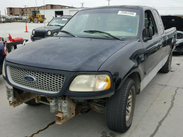 1FTRX17W3XKA68942 - 1999 FORD F150 BLACK photo 2