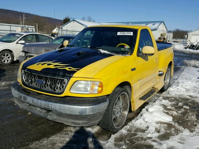 1FTRF07LX2KB69231 - 2002 FORD F150 YELLOW photo 2