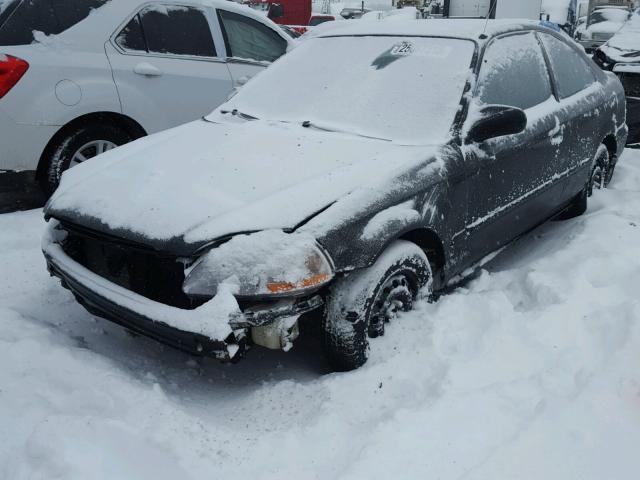 1HGEJ8245VL110423 - 1997 HONDA CIVIC EX შავი ფოტო 2