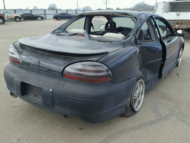 1G2WP12K4XF300713 - 1999 PONTIAC GRAND PRIX BLACK photo 4