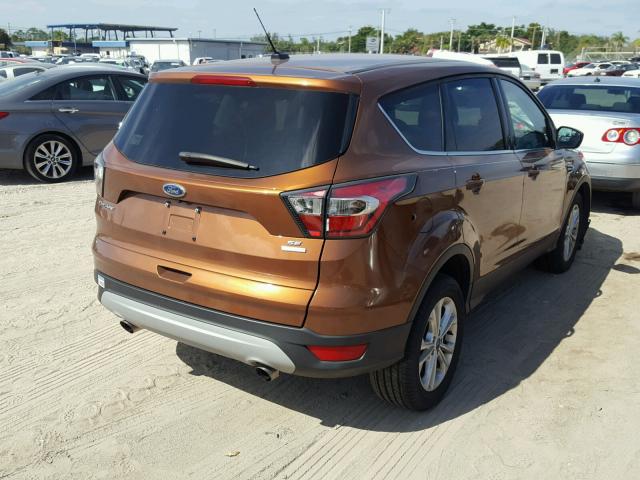 1FMCU0GD2HUB49309 - 2017 FORD ESCAPE SE ORANGE photo 4