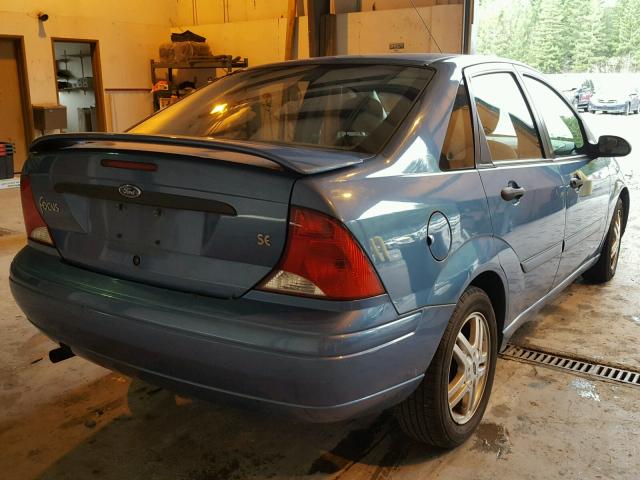 1FAFP3430YW312443 - 2000 FORD FOCUS SE BLUE photo 4