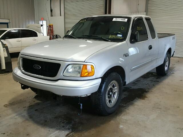 2FTRX17294CA39846 - 2004 FORD F-150 HERI SILVER photo 2