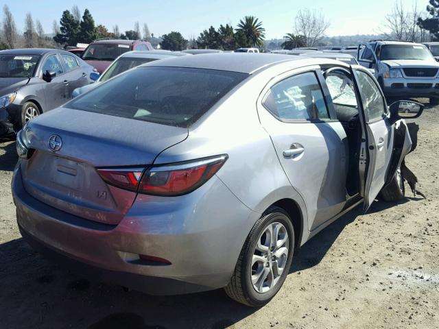 3MYDLBZV1GY121057 - 2016 TOYOTA SCION IA SILVER photo 4