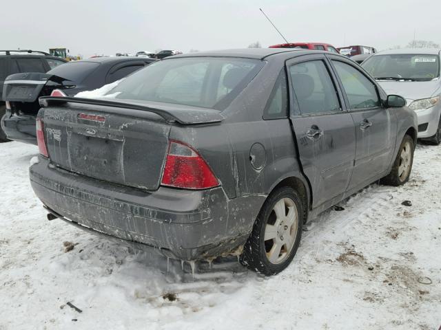 1FAFP34N57W311627 - 2007 FORD FOCUS ZX4 GRAY photo 4