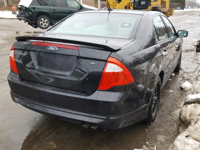 3FAHP0HA2BR133640 - 2011 FORD FUSION SE BLACK photo 4