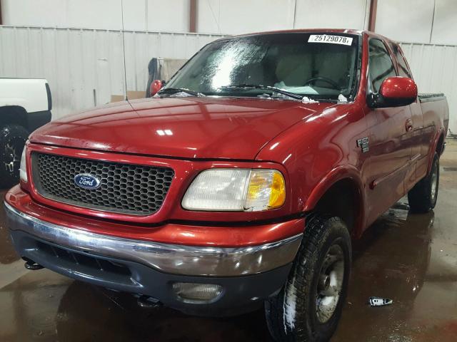 1FTPX18L6YNA73533 - 2000 FORD F150 RED photo 2