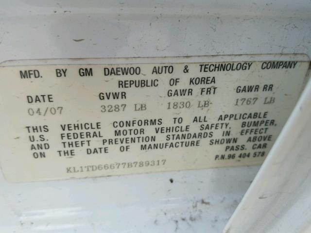 KL1TD66677B789317 - 2007 CHEVROLET AVEO BASE Biały zdjęcie 10