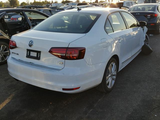 3VWL17AJ1HM375783 - 2017 VOLKSWAGEN JETTA SEL WHITE photo 4