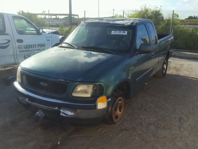 1FTDX1768VND41993 - 1997 FORD F150 GREEN photo 2