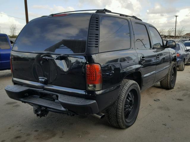 1GKEK13T32R274713 - 2002 GMC YUKON BLACK photo 4