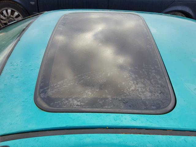 1HGEJ1166PL018122 - 1993 HONDA CIVIC EX TEAL photo 9