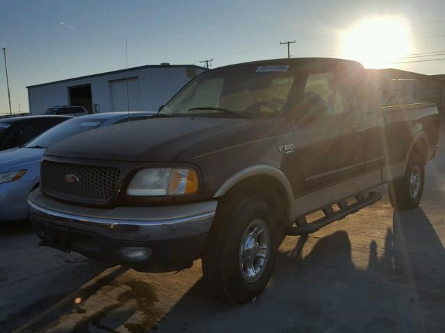 1FTRX18L1YNB06494 - 2000 FORD F150 MAROON photo 2