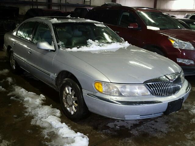 1LNHM97V81Y662856 - 2001 LINCOLN CONTINENTA GRAY photo 1