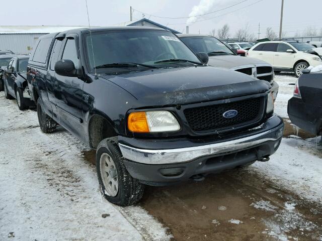 2FTRX18W24CA39527 - 2004 FORD F-150 HERI BLACK photo 1