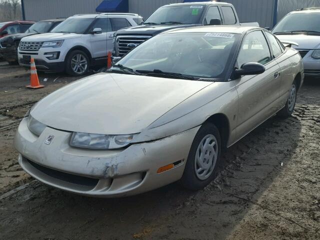 1G8ZP1283XZ316147 - 1999 SATURN SC1 TAN photo 2