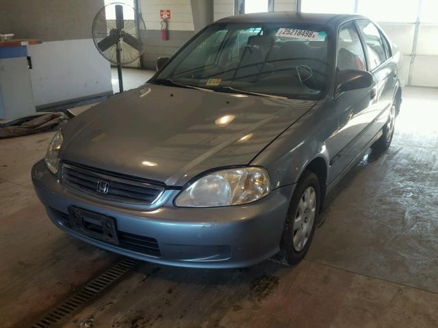 1HGEJ6576XL049709 - 1999 HONDA CIVIC LX TEAL photo 2