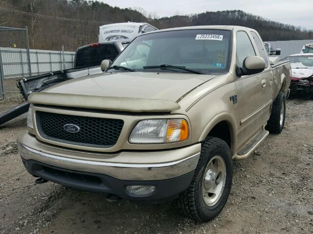 1FTRX18L8YNA24083 - 2000 FORD F150 GOLD photo 2