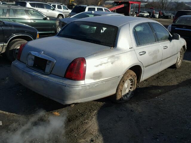 1LNFM81W8WY709667 - 1998 LINCOLN TOWN CAR E SILVER photo 4