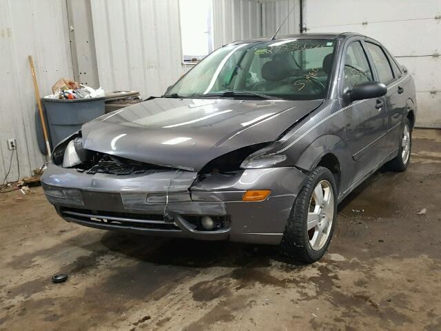 1FAHP34N97W248184 - 2007 FORD FOCUS ZX4 GRAY photo 2