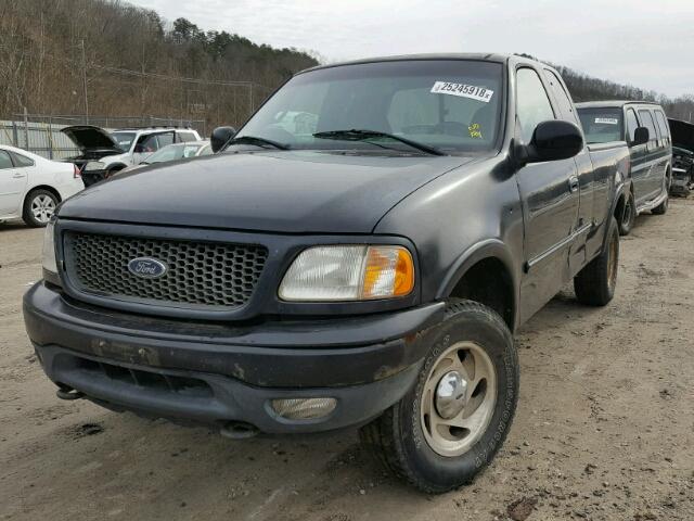 1FTRX18WXYNB41884 - 2000 FORD F150 BLACK photo 2