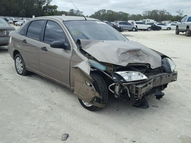 1FAFP34N85W175667 - 2005 FORD FOCUS ZX4 TAN photo 1