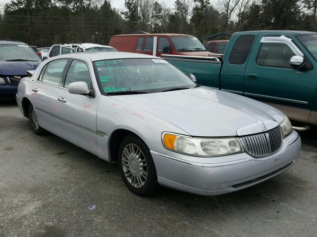 1LNHM81W5YY796374 - 2000 LINCOLN TOWN CAR E SILVER photo 1