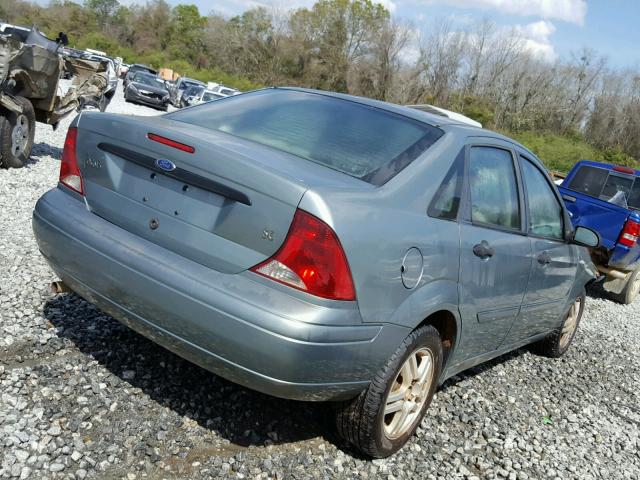 1FAFP34Z93W260484 - 2003 FORD FOCUS SE C TEAL photo 4