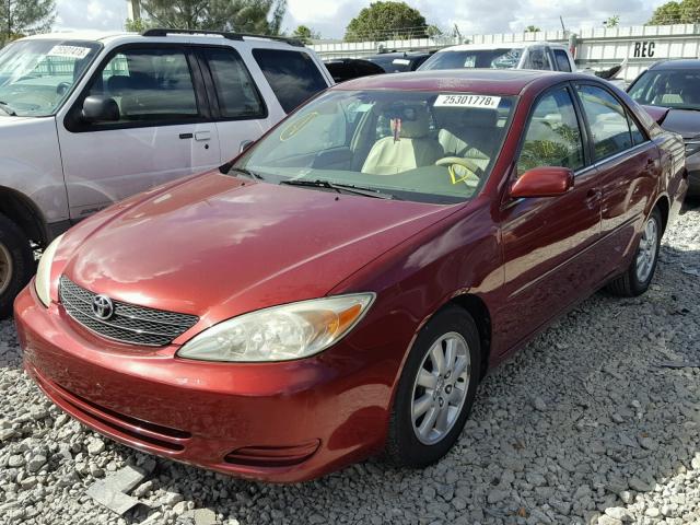 JTDBF30KX20011651 - 2002 TOYOTA CAMRY LE RED photo 2