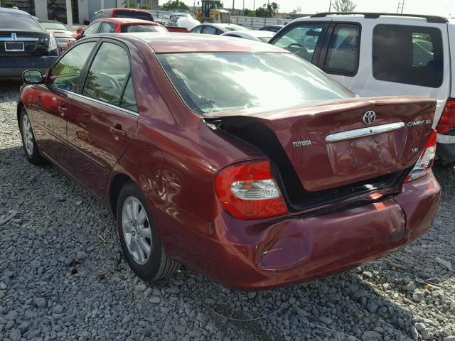 JTDBF30KX20011651 - 2002 TOYOTA CAMRY LE RED photo 3