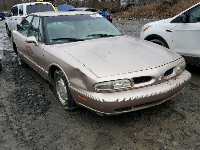 1G3HC52KXX4829666 - 1999 OLDSMOBILE 88 50TH AN GOLD photo 1