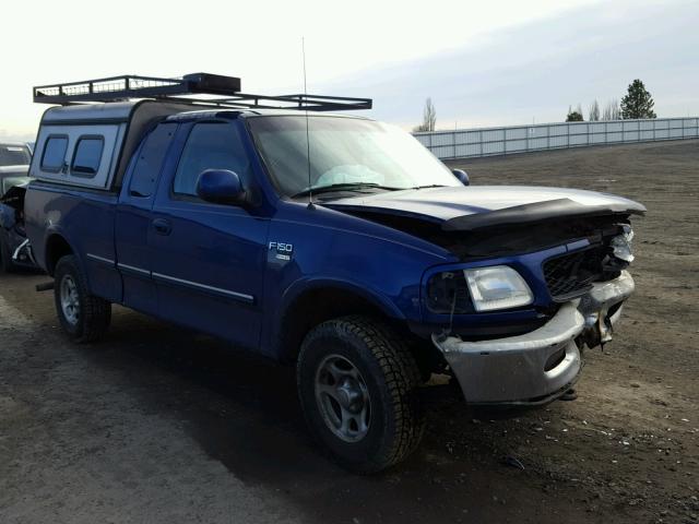 2FTZX1860WCA42848 - 1998 FORD F150 BLUE photo 1