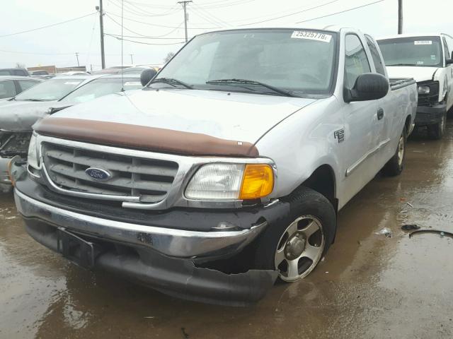 2FTRX17W24CA98191 - 2004 FORD F-150 HERI SILVER photo 2